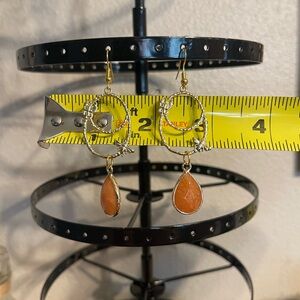 Coral colored agates with bee connectors.